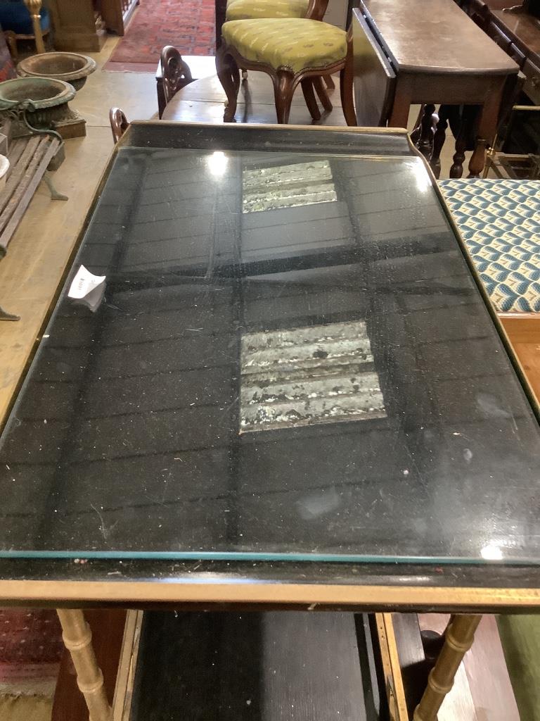 An ebonised brass and lacquer drinks trolley, width 77cm, depth 44cm, height 66cm